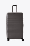 The Large Check-In Roller in Charcoal